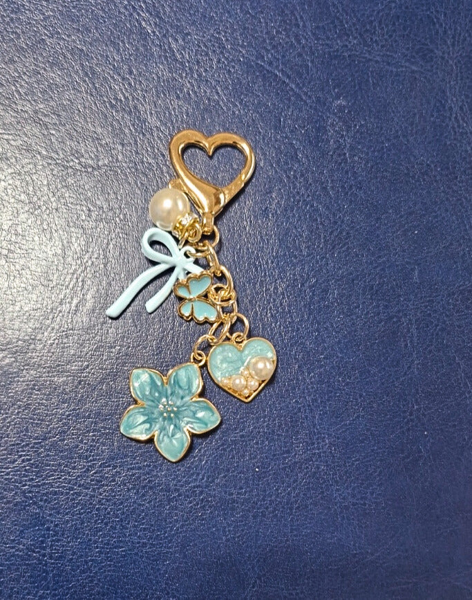 Flower and bow binder charms