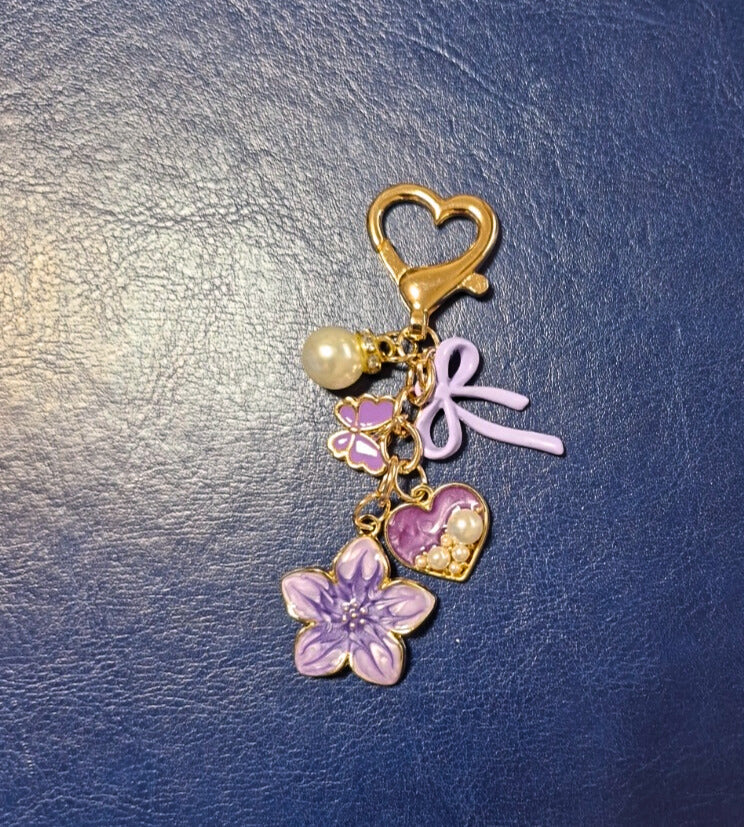 Flower and bow binder charms