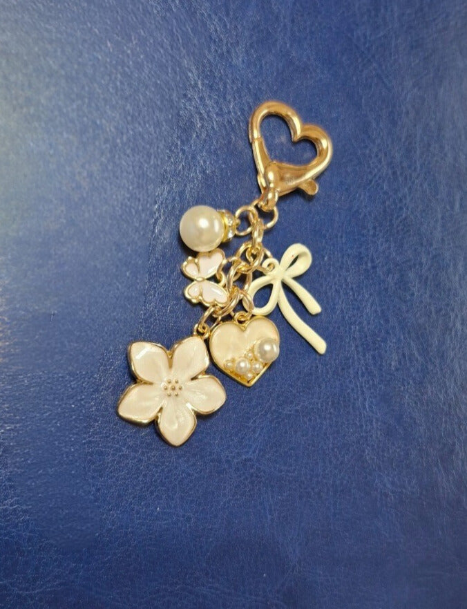 Flower and bow binder charms