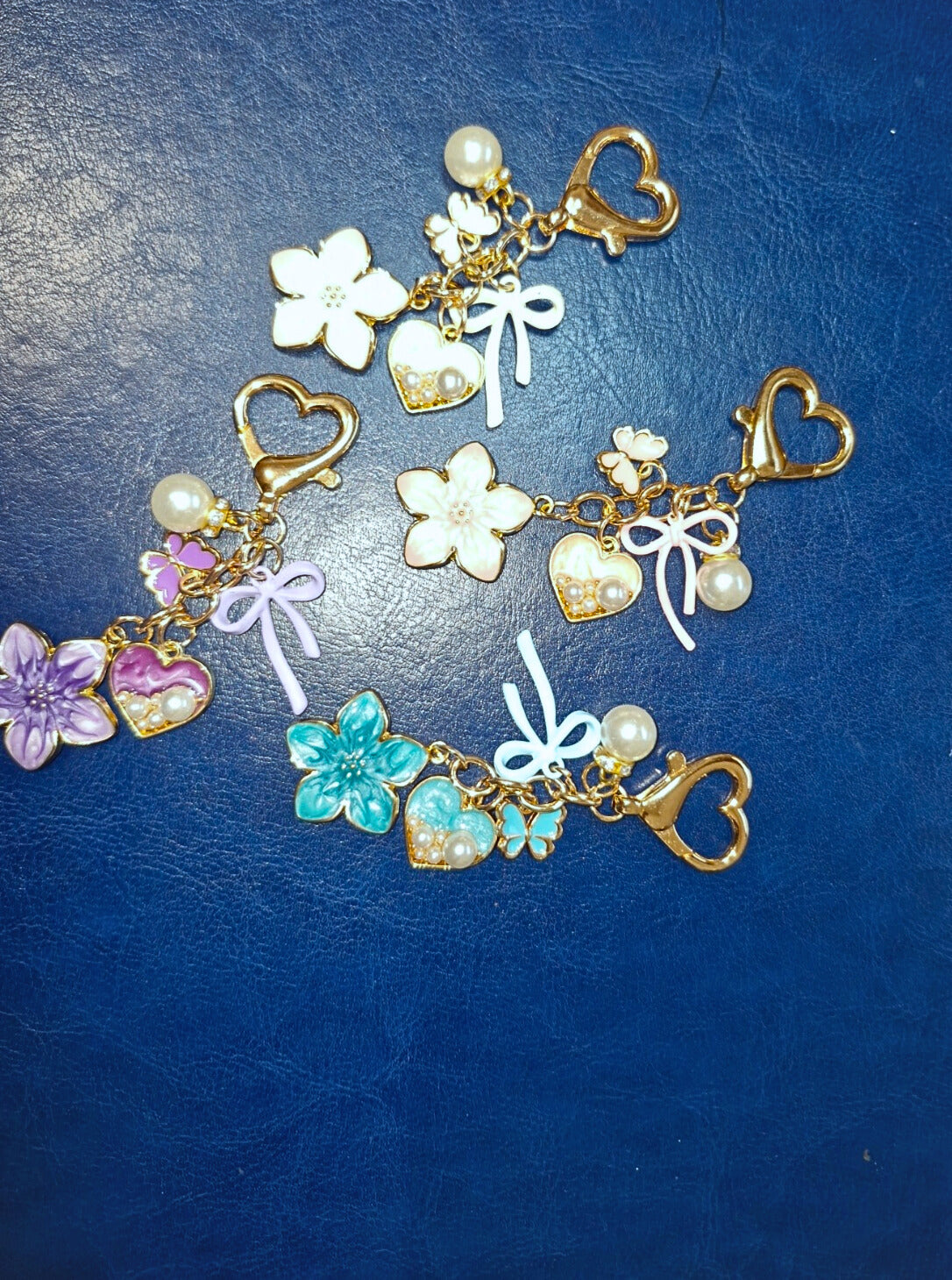 Flower and bow binder charms